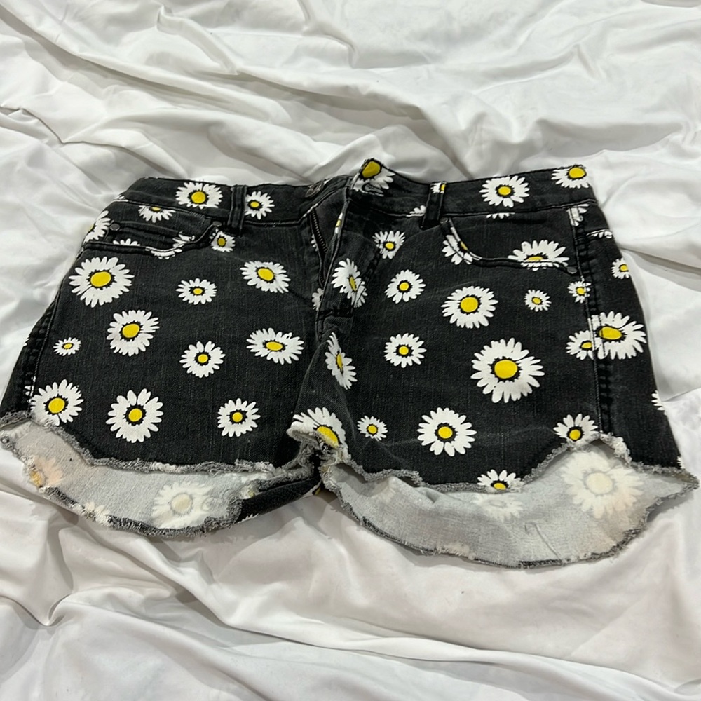 Women’s size small sunflower, black shorts